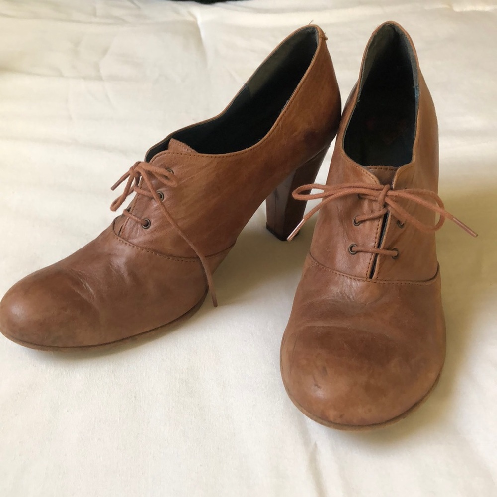 Lace up, leather shoes with 3.5 inch heel.
